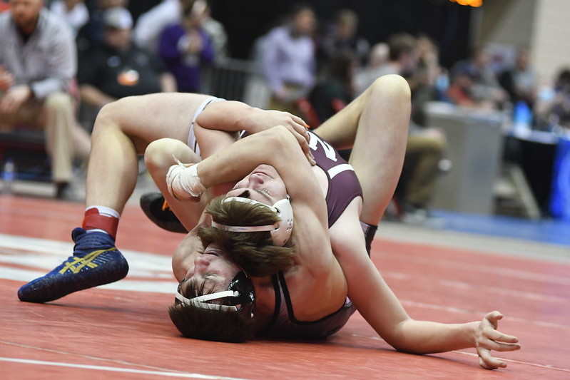 Caleb McGregor's wrestling Cody Donnelly of Philip Area in the semifinals.